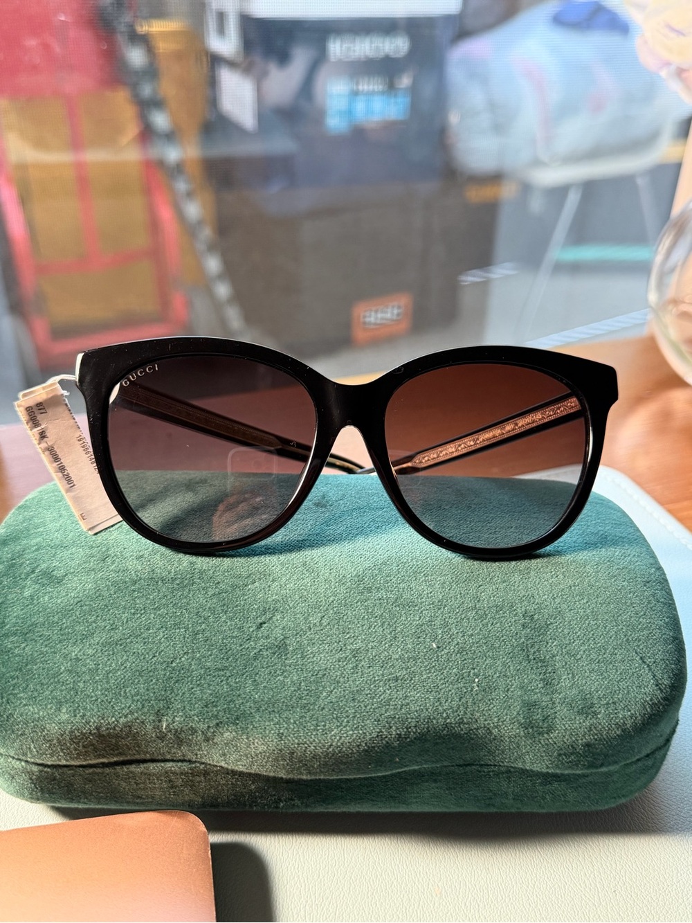 Gucci Black Frame Sunglasses with Brown Gradient Lenses